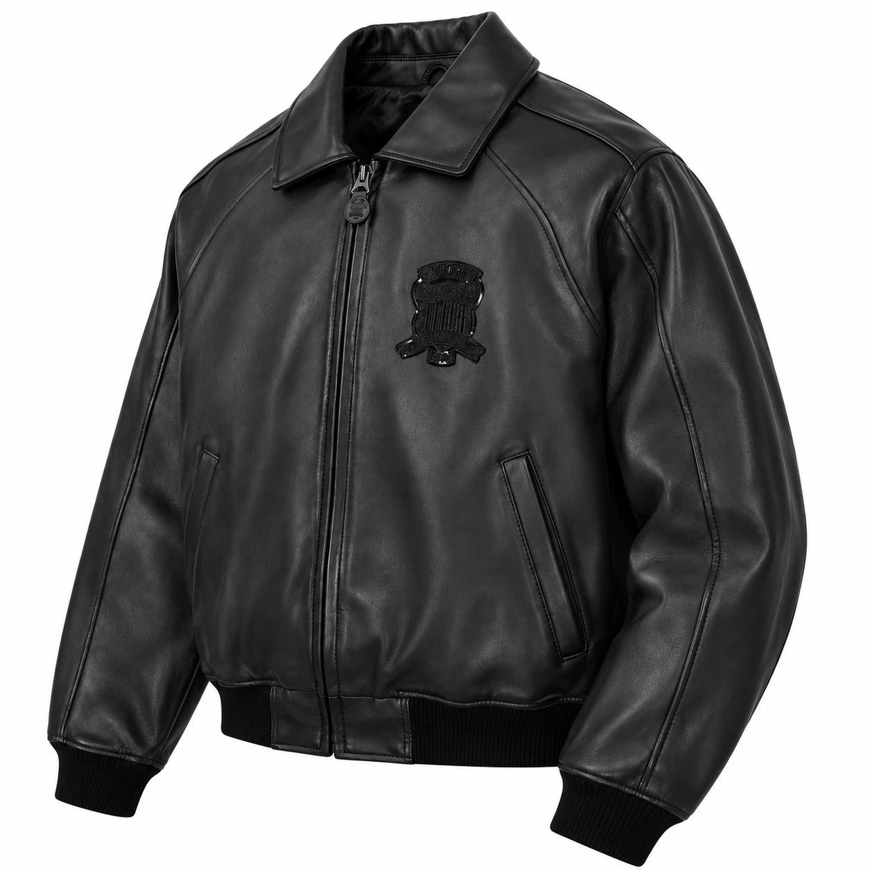 Three-quarter front view of Avirex men’s black leather bomber with tonal chest crest, zip closure and rib-knit cuffs