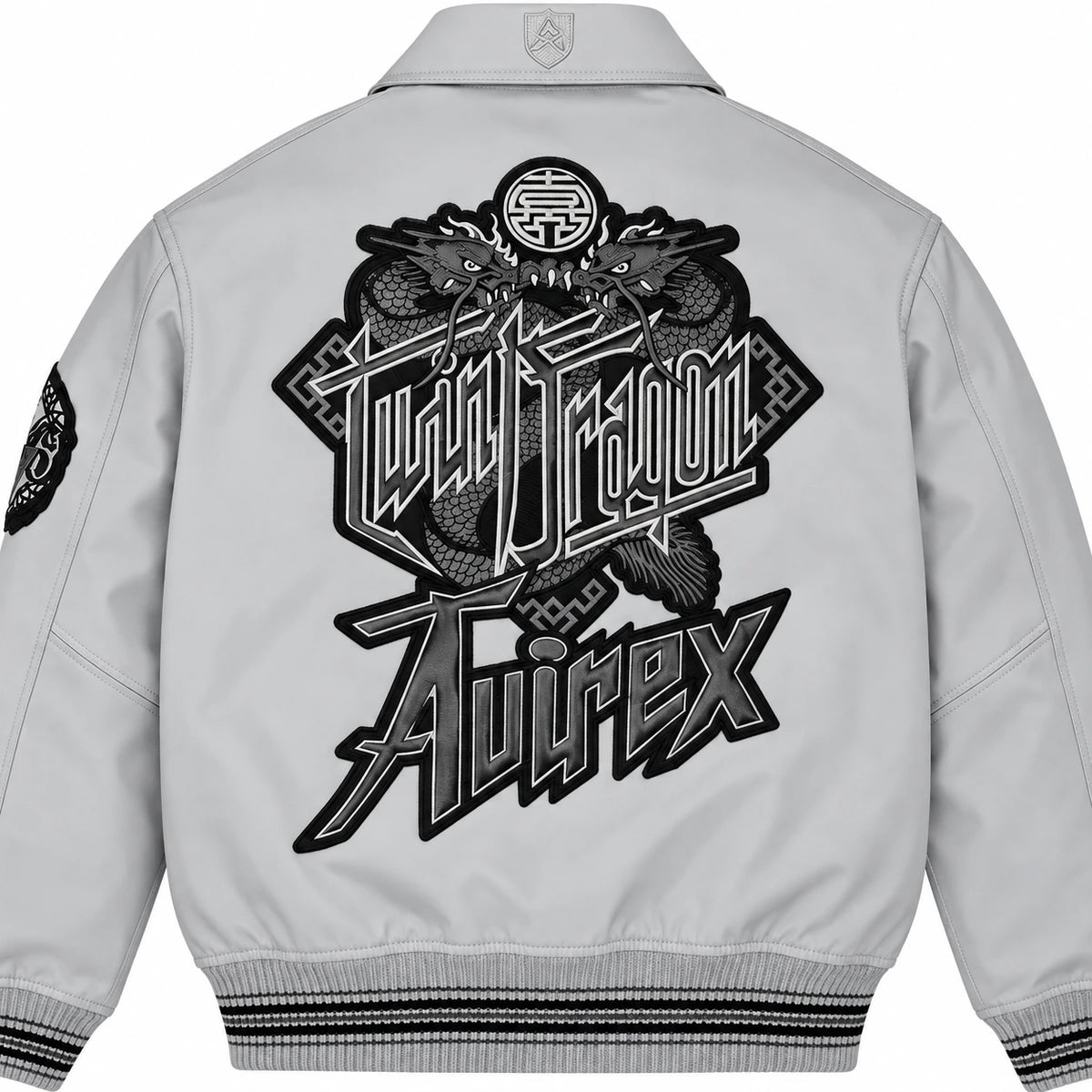 Close-up back view of grey Avirex leather jacket showing oversized black Twin Dragon graphic artwork and Avirex lettering