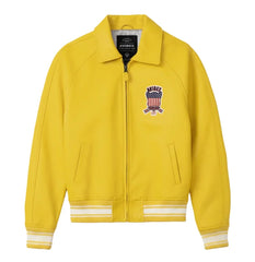 Front view of Avirex men’s yellow leather varsity bomber with chest shield patch, front zip and striped rib-knit trims