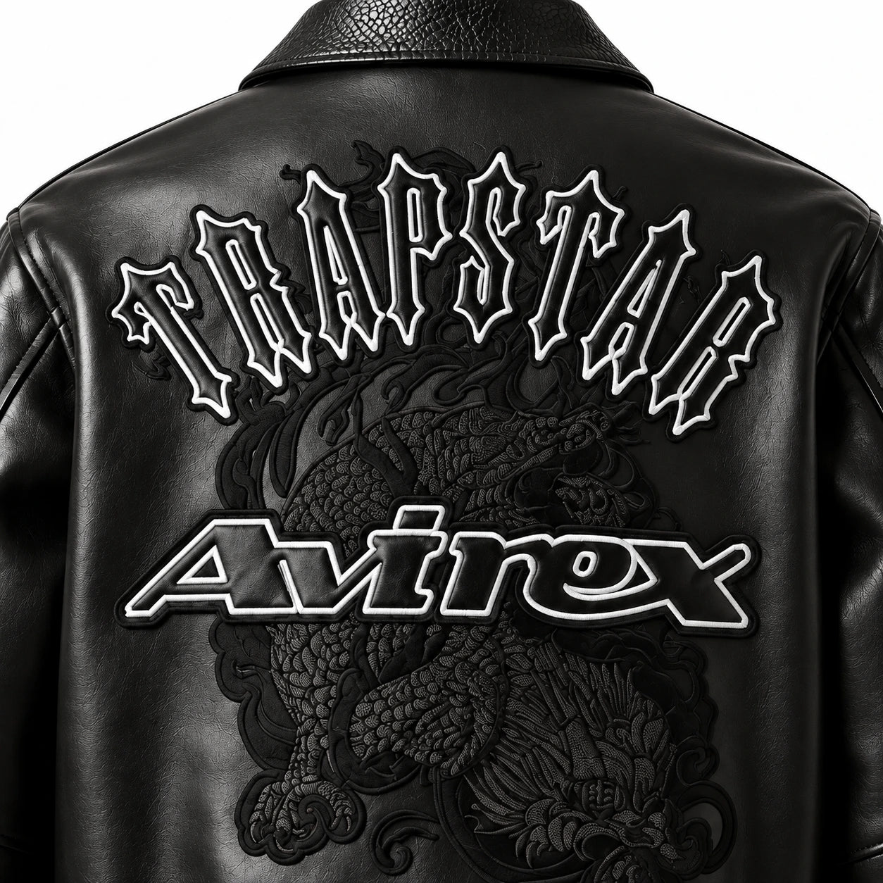 Close-up of Trapstar and Avirex back graphic on black lambskin leather bomber jacket