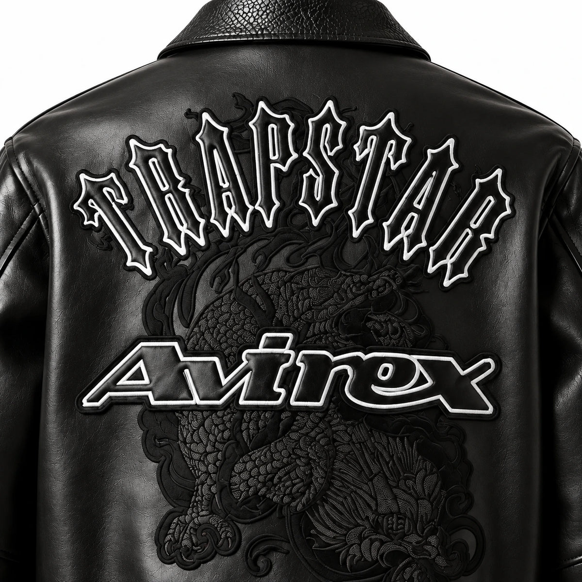 Close-up of Trapstar and Avirex back graphic on black lambskin leather bomber jacket
