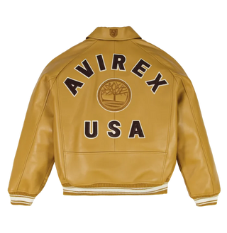Back view of tan Avirex x Timberland leather jacket with AVIREX USA lettering and tonal tree emblem