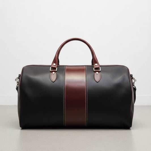 black leather duffle bag with brown center stripe and double handles.