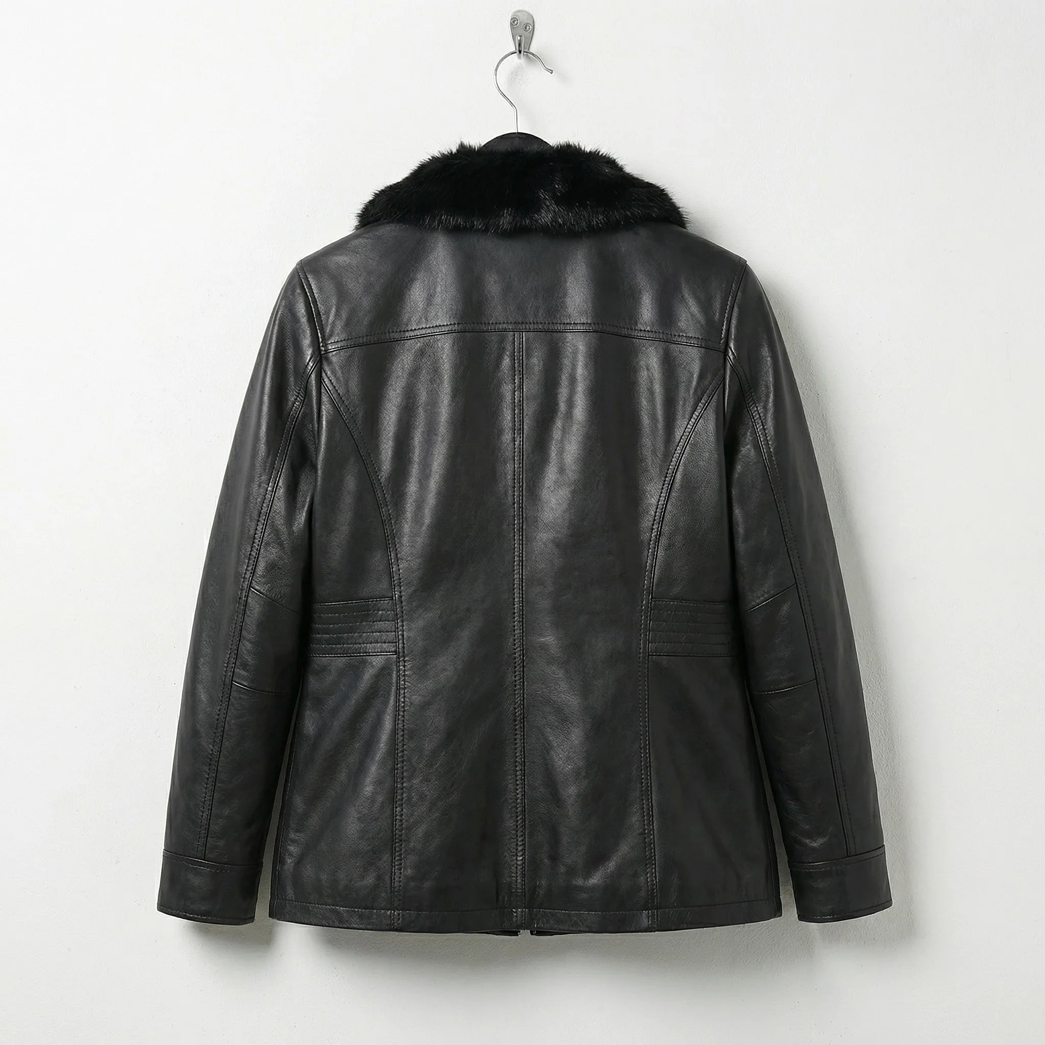 Back view of womens black leather jacket with fur collar