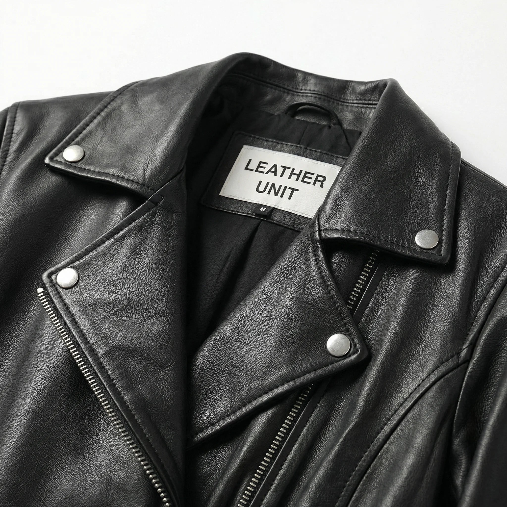 Notched lapel collar and metal snaps on Leather Unit black biker jacket