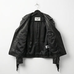 Interior lining of black leather fringe jacket showing inner pockets