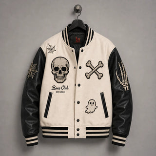Front hanger view of Bone Club Halloween jacket with skull, crossbones, ghost, spider-web and skeleton-hand embroidery