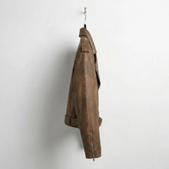 Side view of womens brown biker leather jacket with zip cuff
