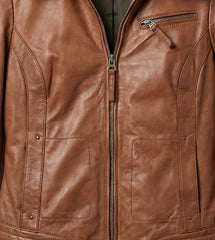 Front zipper and pockets detail on womens brown bomber leather jacket