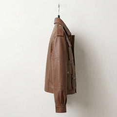 Side view of womens brown leather bomber jacket with shirt collar