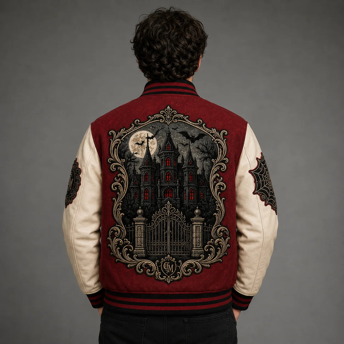 Back view of Crimson Manor Halloween Varsity Jacket featuring gothic manor embroidery