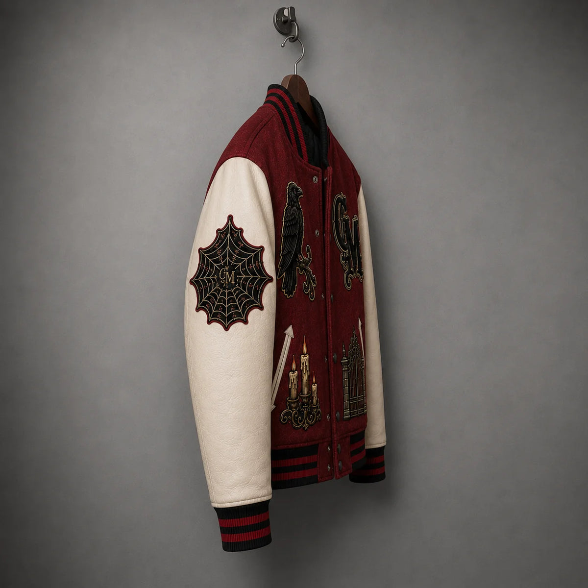 Side view of Crimson Manor Halloween Varsity Jacket showing embroidered sleeve patch details