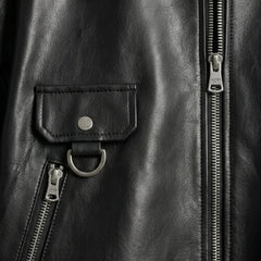 Zip pockets and flap pocket with D ring on black leather jacket women
