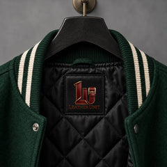 Close-up of Crypt Academy jacket collar, black quilted lining and Leather Unit interior branding patch