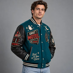 Three-quarter view of teal Halloween varsity jacket with black PU leather sleeves and retro motel patches