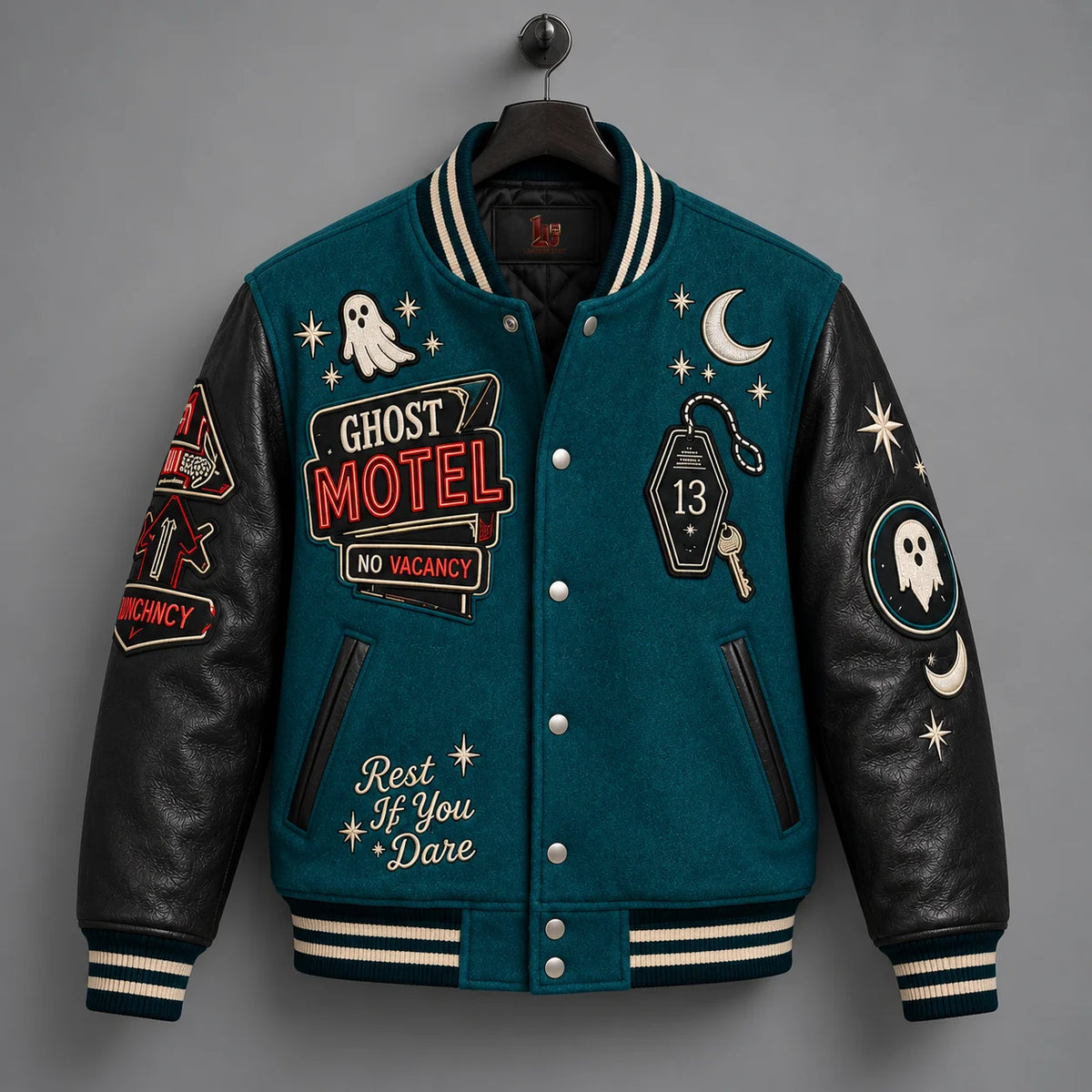 Front hanger view of Ghost Motel jacket featuring ghost, crescent moon, motel sign and room 13 embroidery