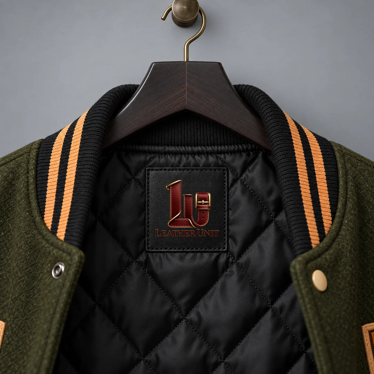 Close-up of black quilted polyester lining, orange and black rib-knit collar and Harvest Hex inner label