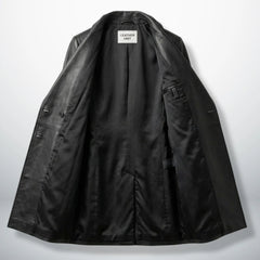 Inside lining of women’s black leather coat showing full black interior