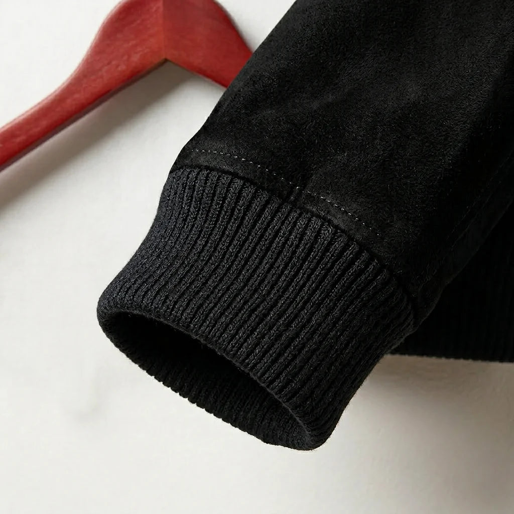 Ribbed cuff detail on men's black suede leather bomber jacket