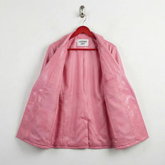 Inside lining of blush pink leather blazer with inner pocket