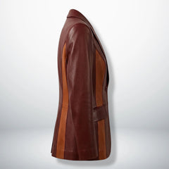 Side profile of tailored burgundy and brown two‑tone leather blazer