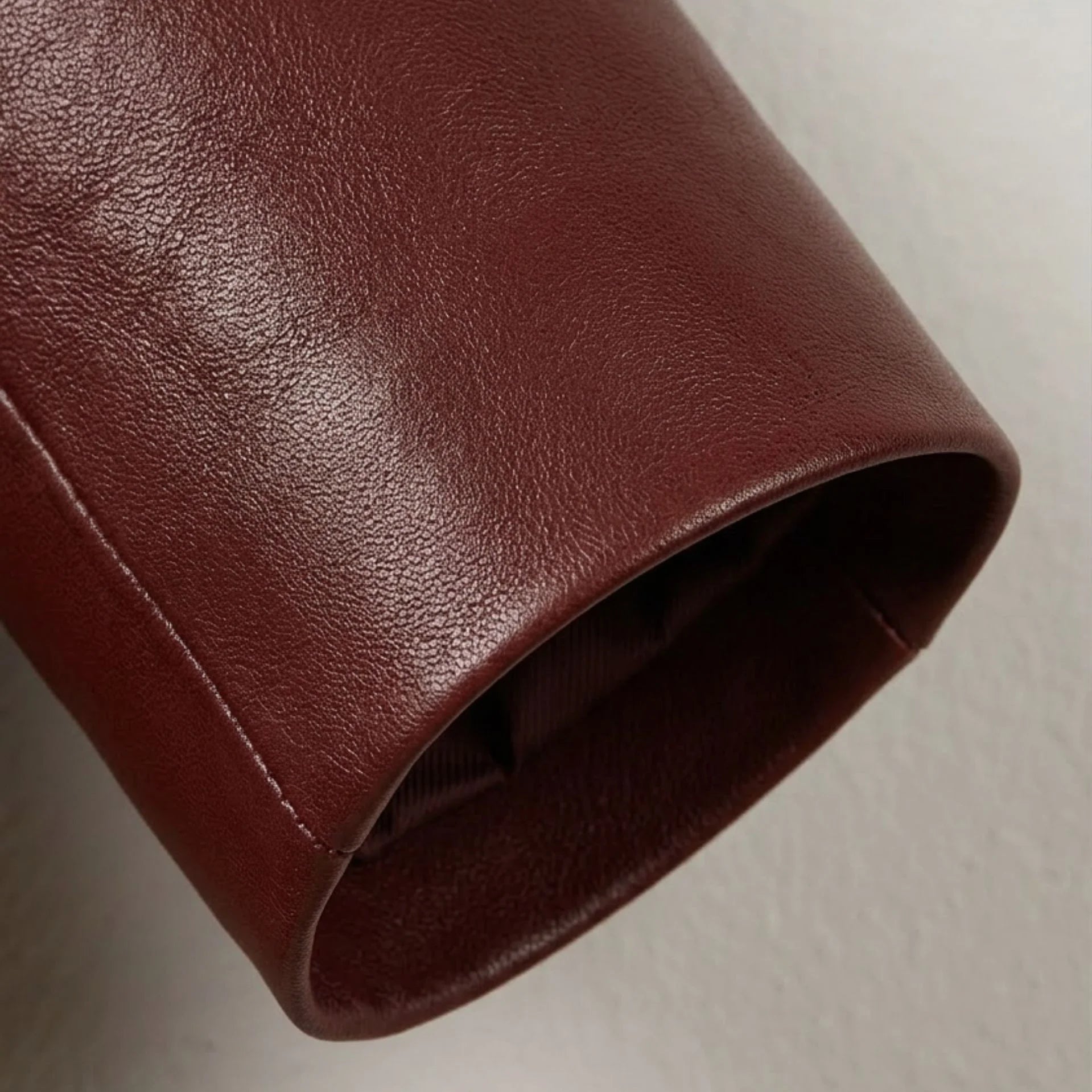 Sleeve cuff detail on smooth burgundy lambskin leather blazer