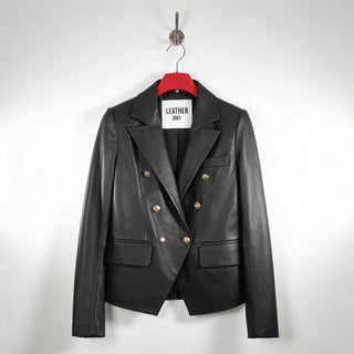 Front view of women’s double breasted black leather blazer with gold buttons by Leather Unit