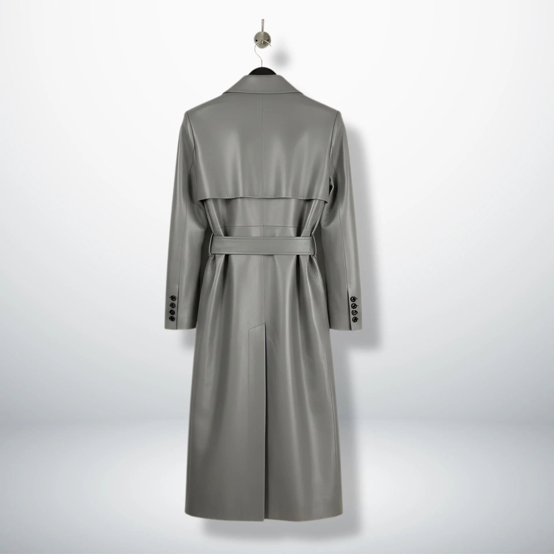 Back view of long belted grey leather trench coat with storm flap