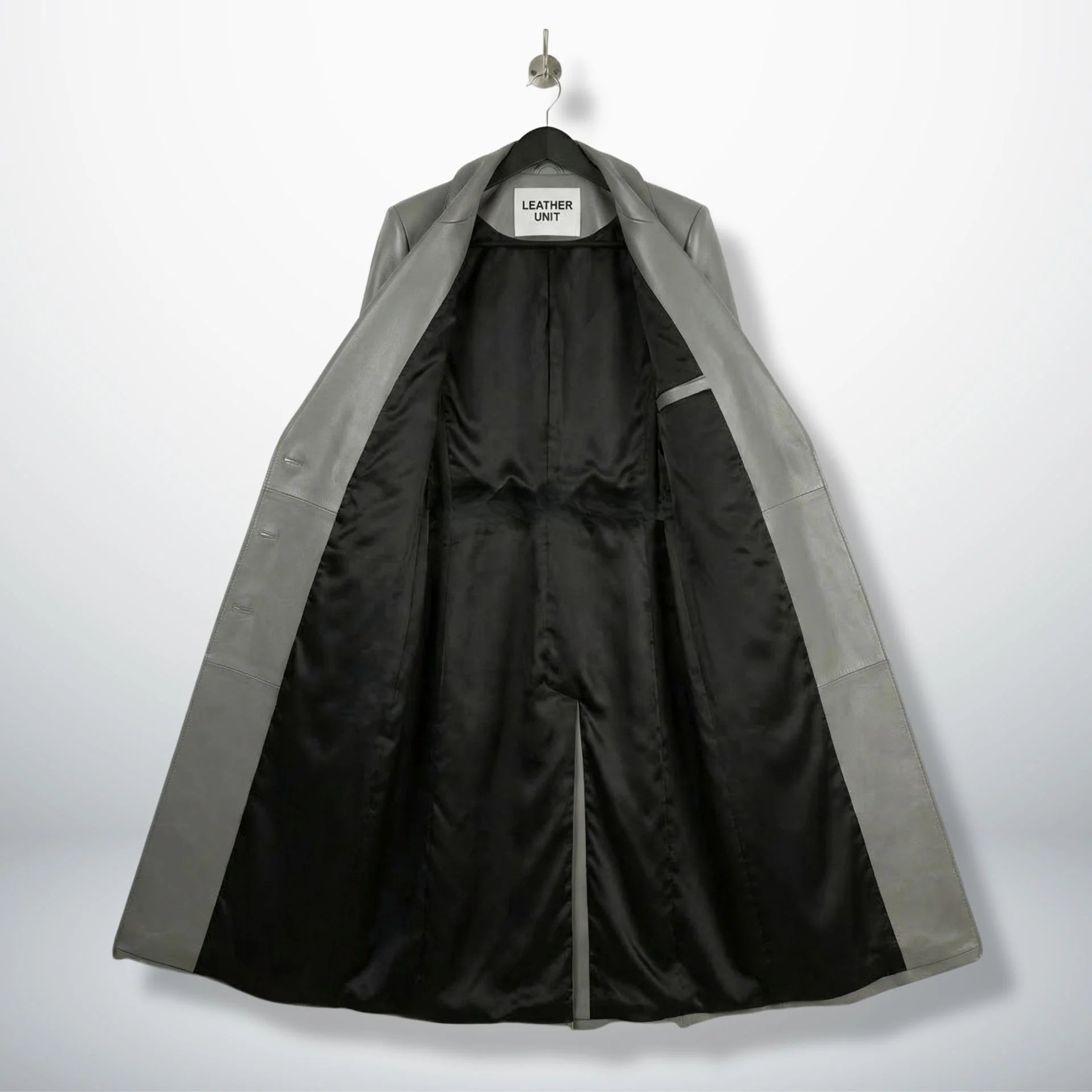 Side profile of full‑length grey leather trench coat for women