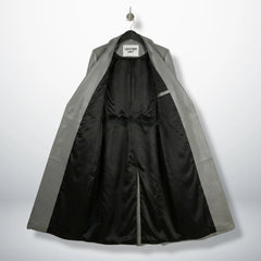 Side profile of full‑length grey leather trench coat for women