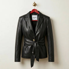 Front view of jet black belted women’s leather blazer jacket by Leather Unit