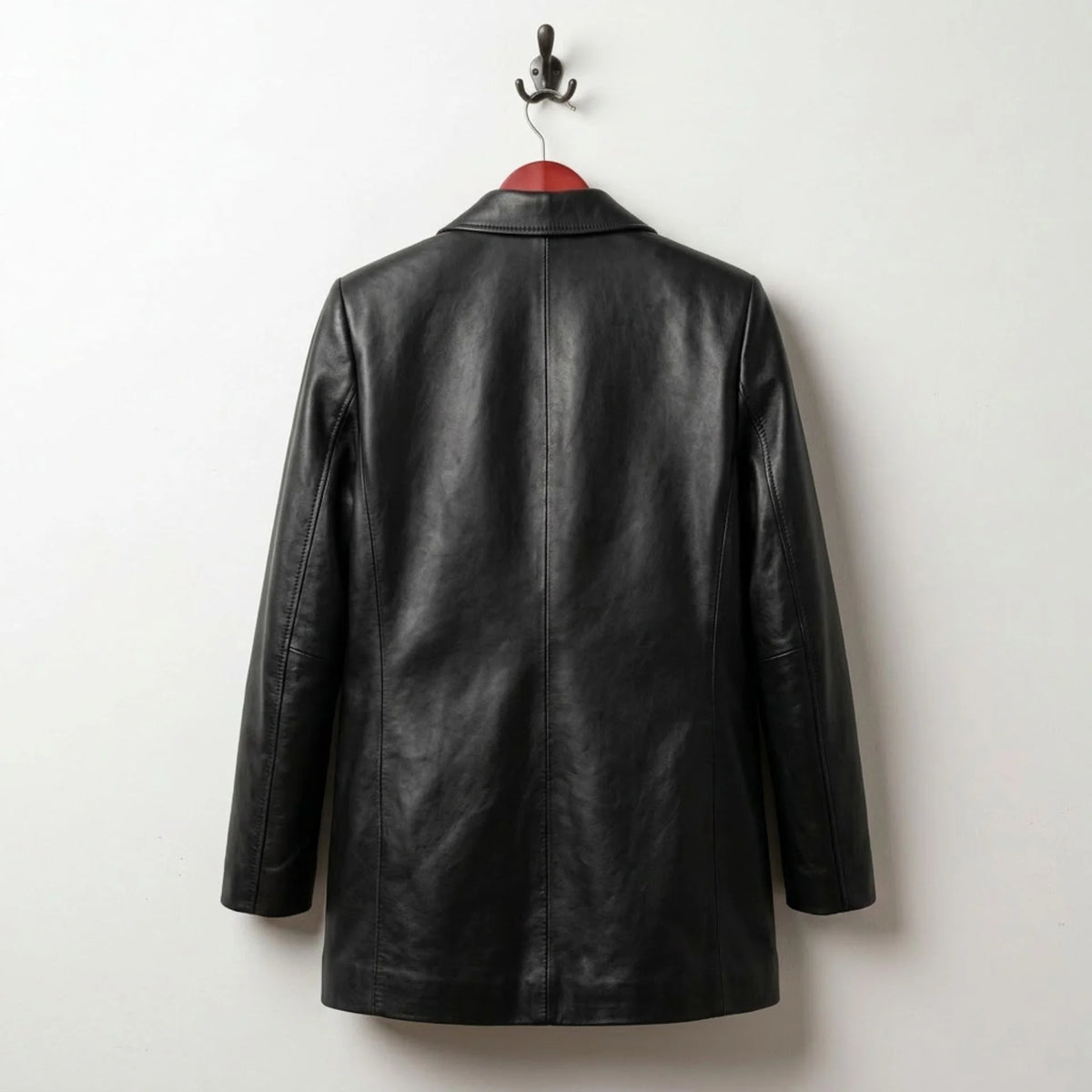 Back view of longline women’s black leather blazer jacket
