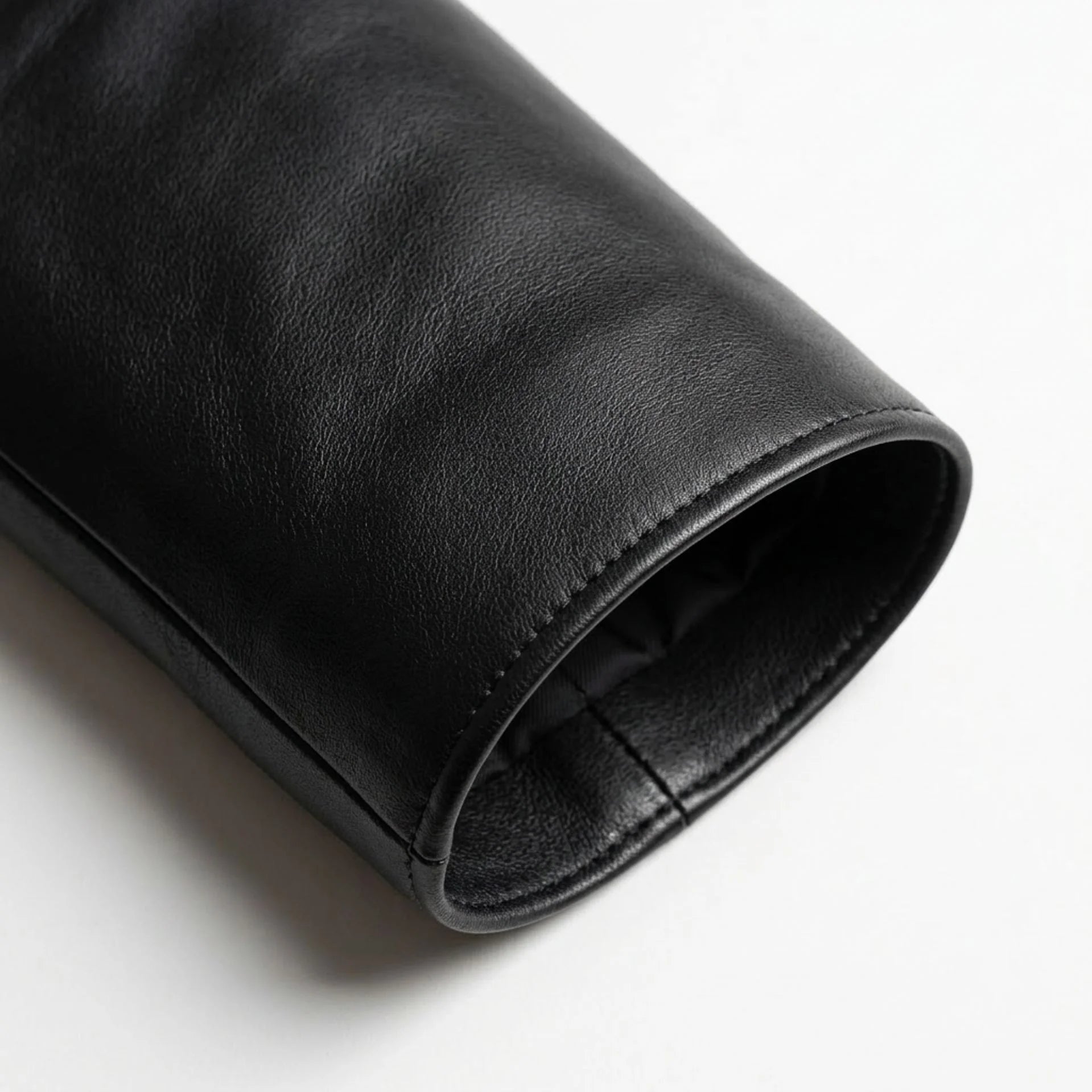 Sleeve cuff detail on smooth jet black leather blazer