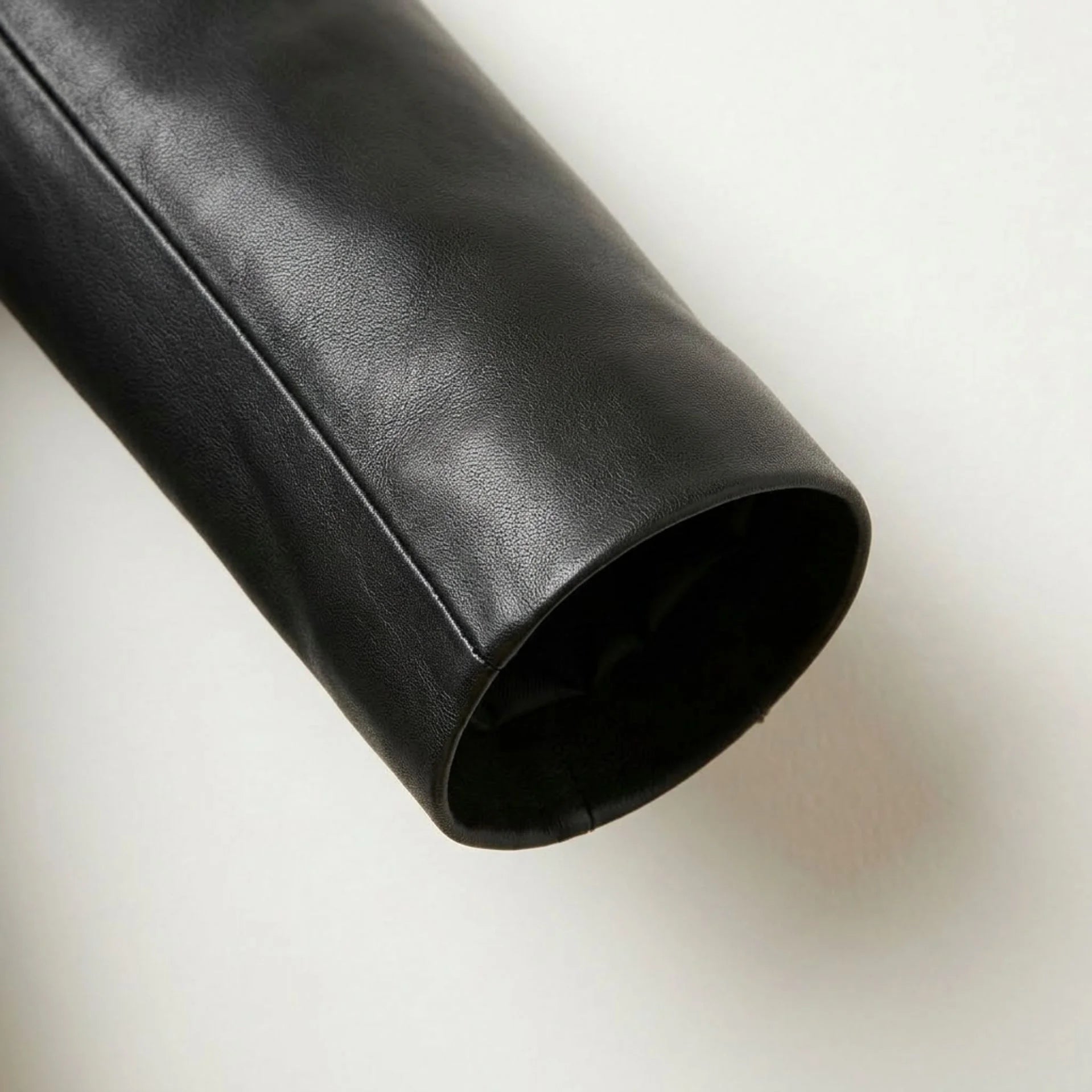 Sleeve cuff detail on smooth jet black women’s leather blazer