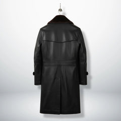 Back view of long black leather shearling coat with yoke detail
