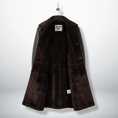 Inside view of fully shearling lined men’s black leather coat