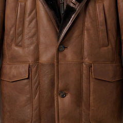 Front buttons, chest pockets and flap pockets on men’s brown fur lined coat