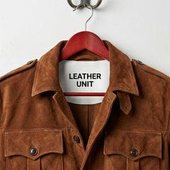 Close-up of collar and shoulder epaulettes on men's brown suede leather coat