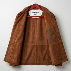 Interior of men's brown suede leather coat showing inner pocket
