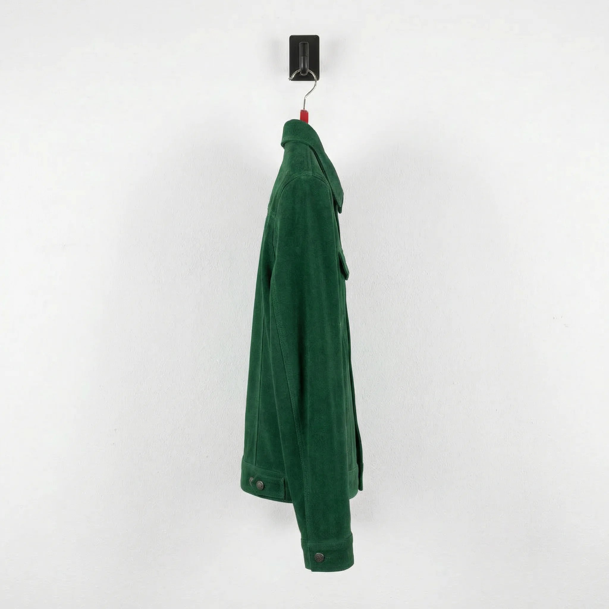 Side profile of men's green suede trucker jacket showing slim fit sleeves
