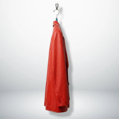 Side profile of men’s red leather blazer with two button closure