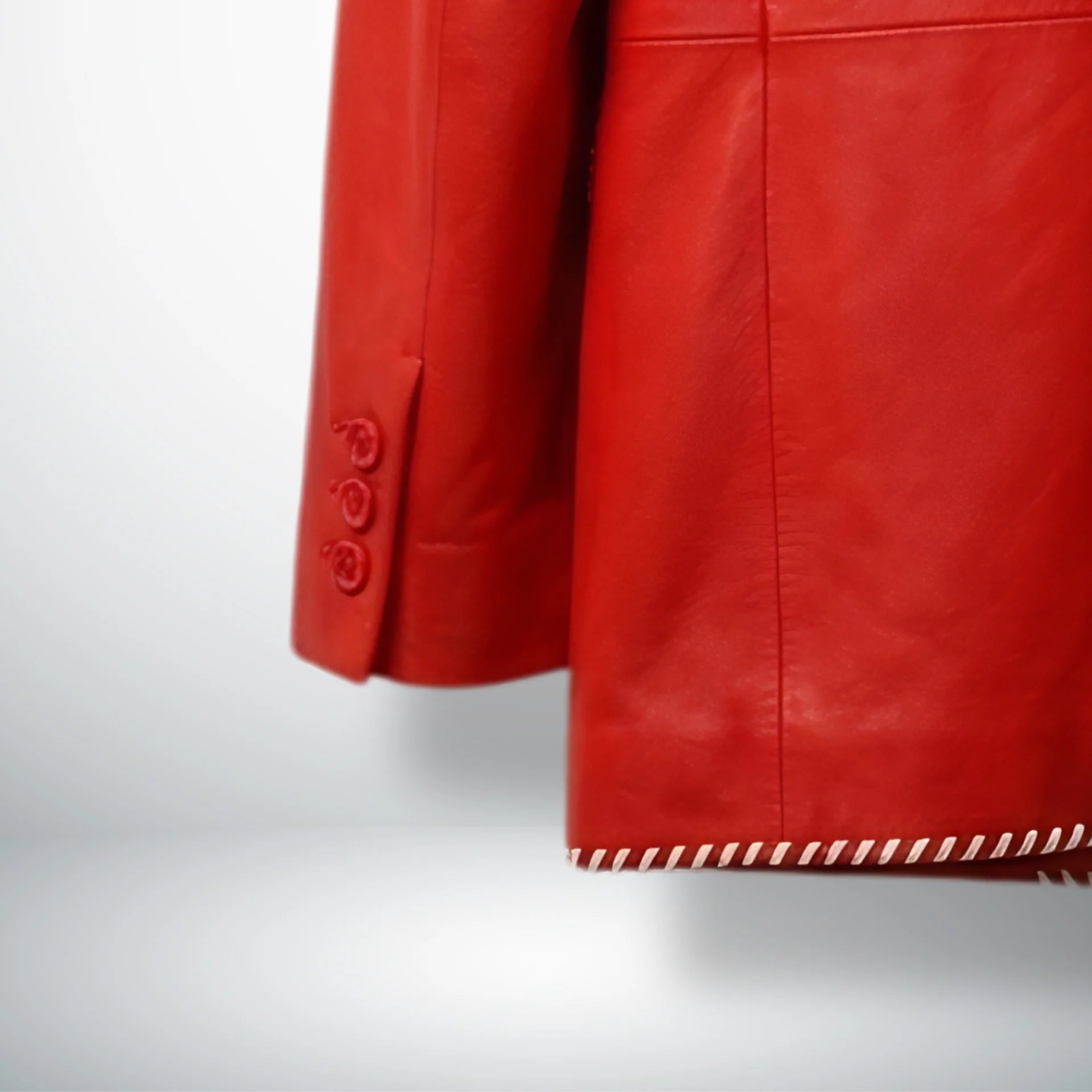 Sleeve cuff buttons on men’s red leather blazer jacket