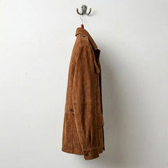 Side profile of men's brown suede field jacket with four pockets