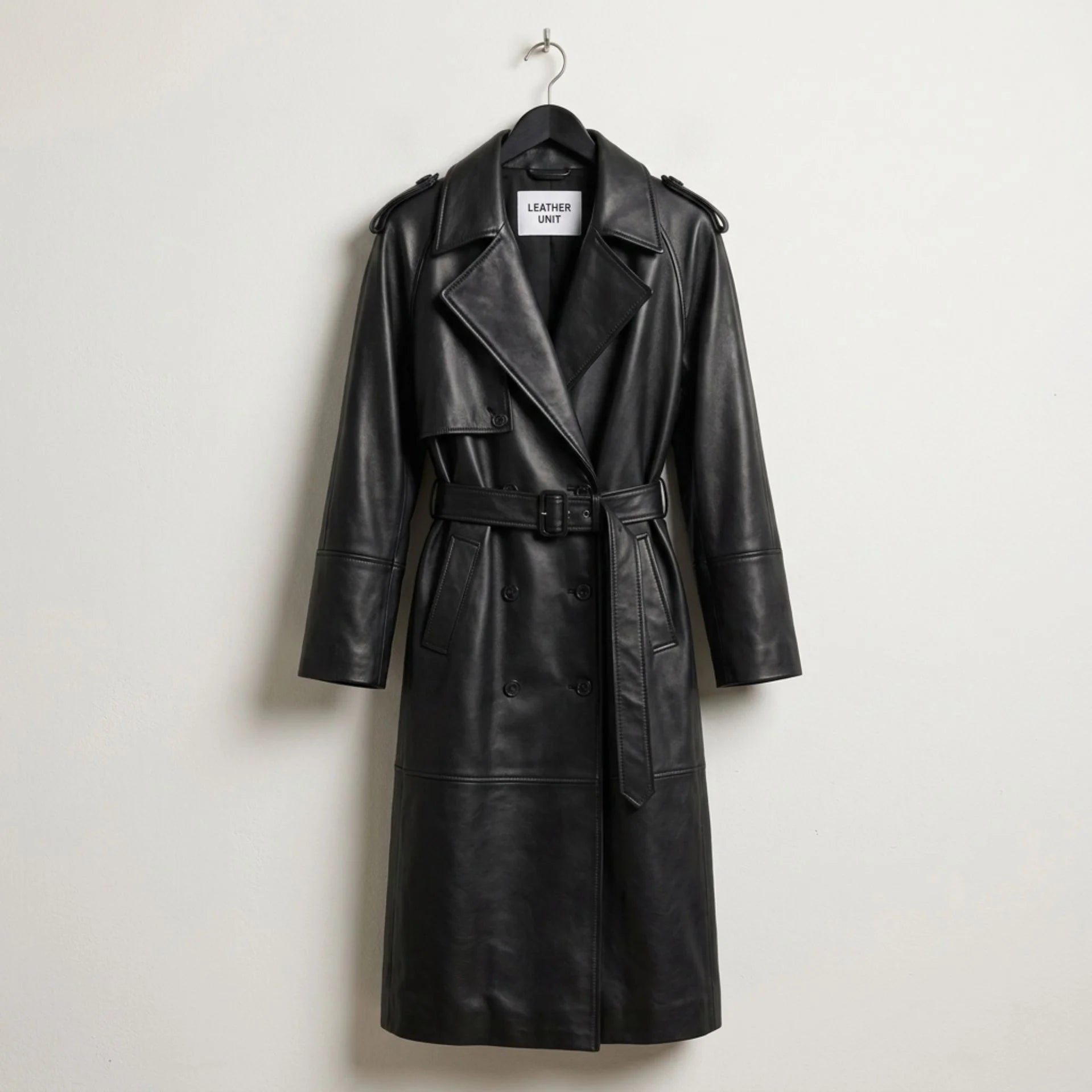 Front view of women’s long black leather trench coat by Leather Unit