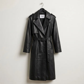 Front view of women’s long black leather trench coat by Leather Unit
