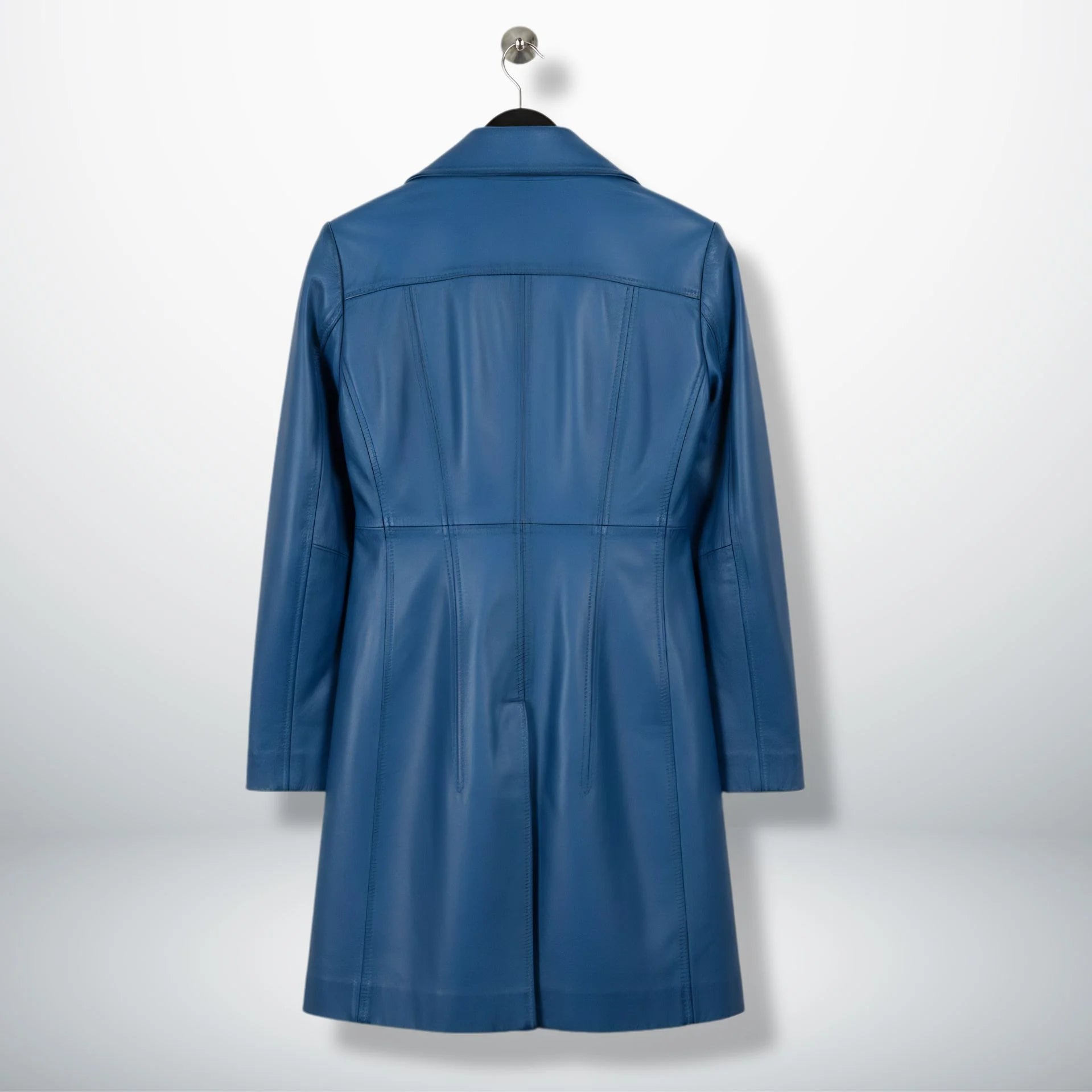 Back view of tailored women’s blue leather long coat with panel seams