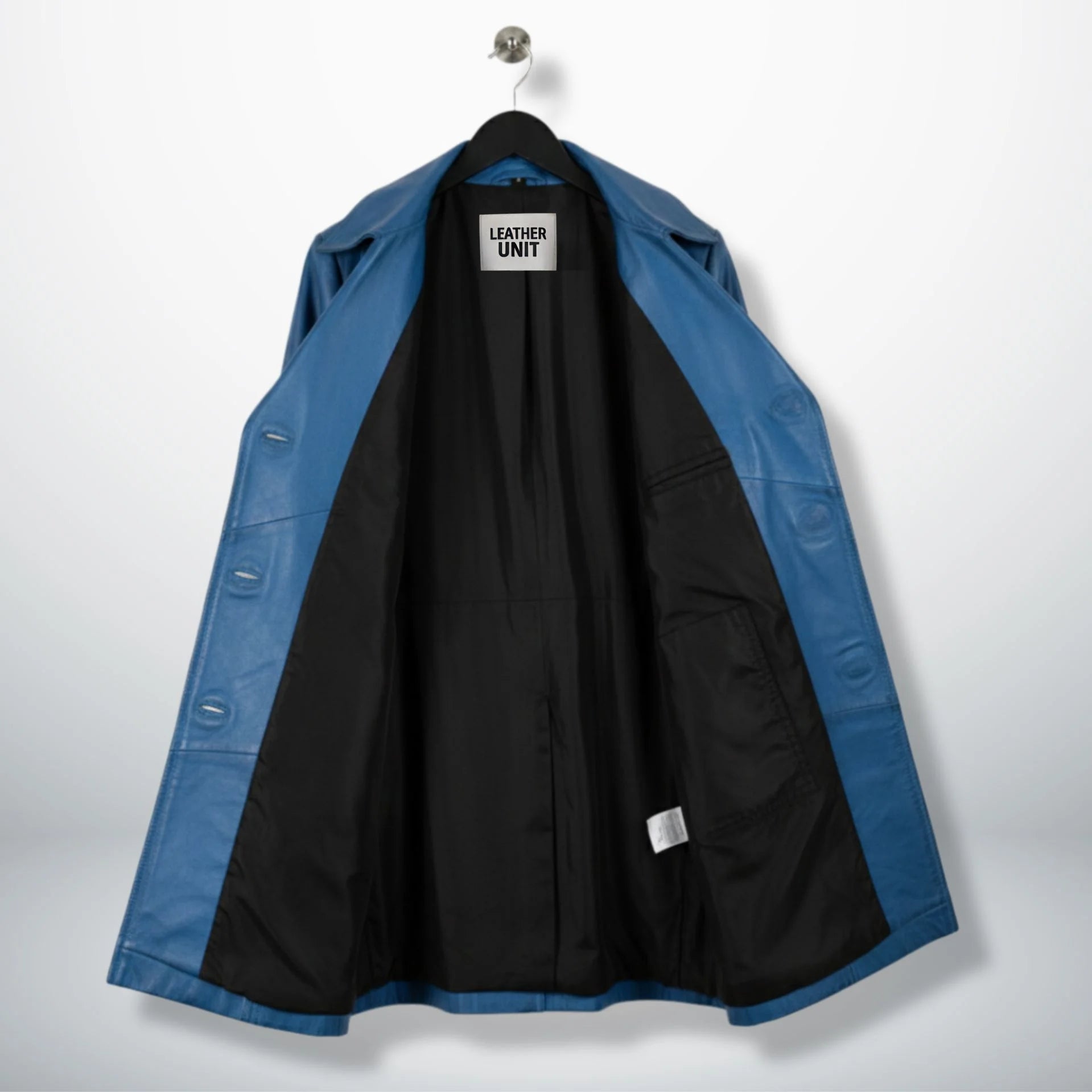 Inside view of fully lined blue waxed leather coat with black lining