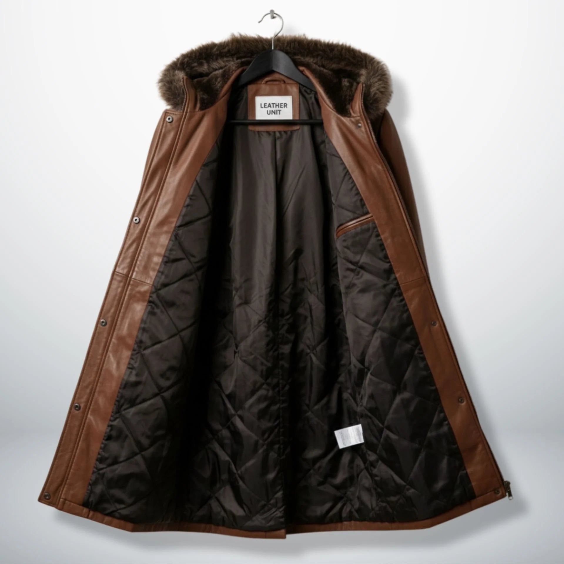 Inside quilted lining of women’s brown hooded leather coat