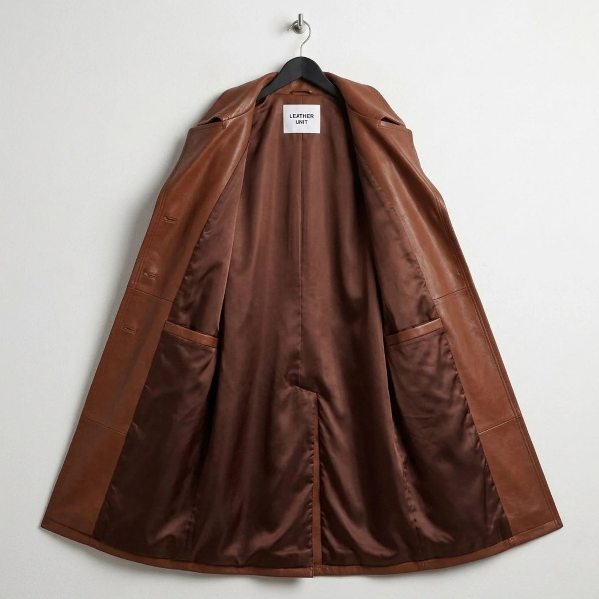 Inside view of fully lined brown leather trench coat for women