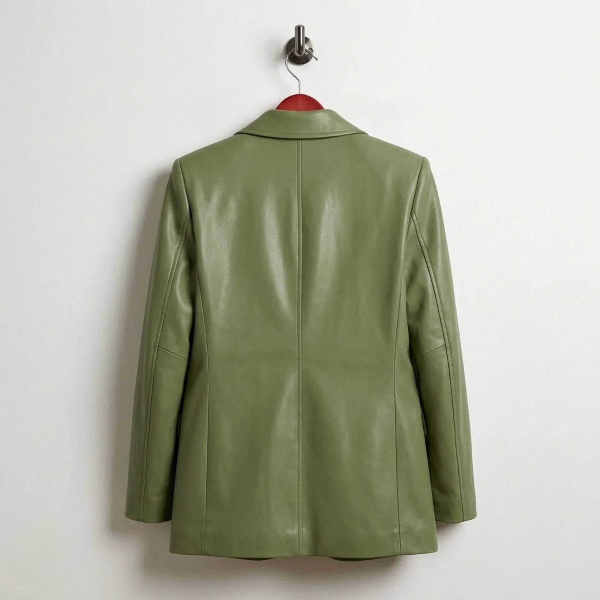 Back view of longline women’s green leather blazer jacket
